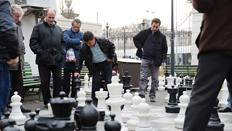 Martin Good/Thinkstock Men play chess in Geneva's Parc des Bastions (Credit: Martin Good/Thinkstock)