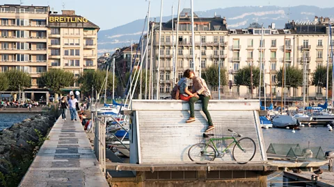 Kevin George/Alamy Couple Kissing on the Pier in Geneva, Switzerland (Credit: Kevin George/Alamy)