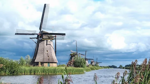 Ann Babe Volunteers show tourists how windmills operate at the World Heritage site of Kinderdijk (Credit: Ann Babe)