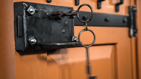 Alexander Aksakov/Getty Clunky iron locks are still fixed to cell block doors (Credit: Alexander Aksakov/Getty)