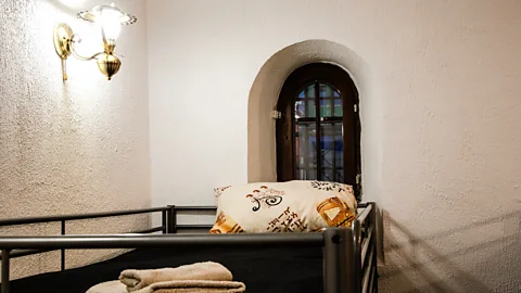 Alexander Aksakov/Getty Guests can now check into sparsely decorated “sweat-box” punishment cells. (Credit: Alexander Aksakov/Getty)