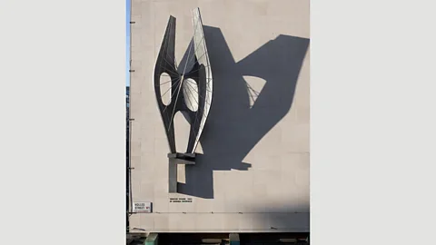 Historic England Barbara Hepworth’s Winged Figure graces the side of John Lewis on London’s Oxford Street (Credit: Historic England)