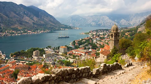 Kiril Stanchev/Alamy Kotor's famed bay snakes past mountains (Credit: Kiril Stanchev/Alamy)
