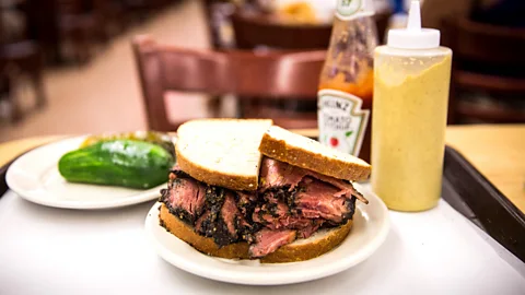 Andrew Burton/Getty Pastrami on rye bread with mustard at Katz’s (Credit: Andrew Burton/Getty)