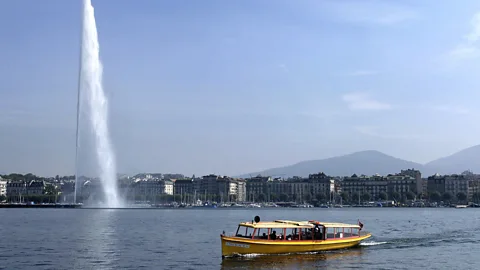 Fabrice Coffrini/Getty Lake Geneva's Jet d’Eau fountain attracts crowds in summer (Credit: Fabrice Coffrini/Getty)