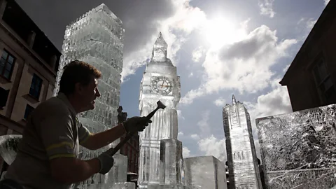Shaun Curry/AFP/Getty British ice sculptor Duncan Hamilton carves ice from his sculpture of London’s skyline in Covent Garden in 2009 (Credit: Shaun Curry/AFP/Getty)