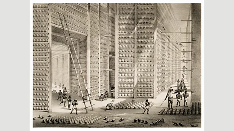 Contraband Collection/Alamy Company buildings abroad were also impressive: this 1851 sketch shows stacks of opium balls at the Company’s opium factory at Patna, India (Credit: Contraband Collection/Alamy)