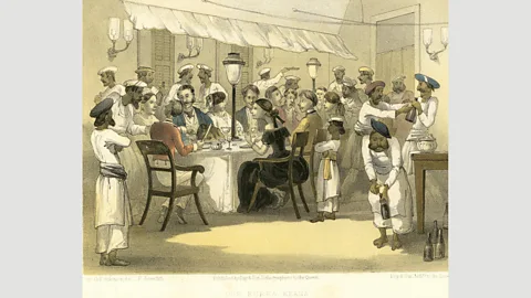 Dinodia Photos/Alamy ‘Our burra khana’, an image of British colonists dining in India (Credit: Dinodia Photos/Alamy)