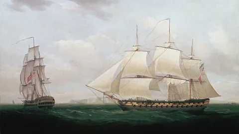 World History Archive/Alamy ‘Two East Indiamen off a Coast’ by Thomas Whitcombe, 1850 (Credit: World History Archive/Alamy)