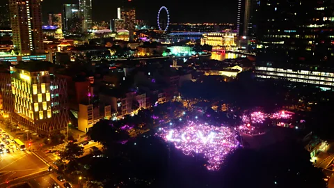 Getty Images Large multinational companies sponsor the annual Pink Dot gay pride event in Singapore, a country in which homosexuality is illegal (Credit: Getty Images)