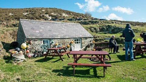 Amanda Ruggeri The Porters’ shop, the only store on Bardsey, sells books, postcards and their own honey, willow baskets and wool (Credit: Amanda Ruggeri)