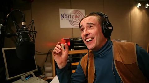 Steve Coogan’s BBC2 series I’m Alan Partridge revelled in the humiliating situations its titular radio host regularly faced (Credit: BBC)