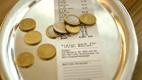 Bill and change on a plate