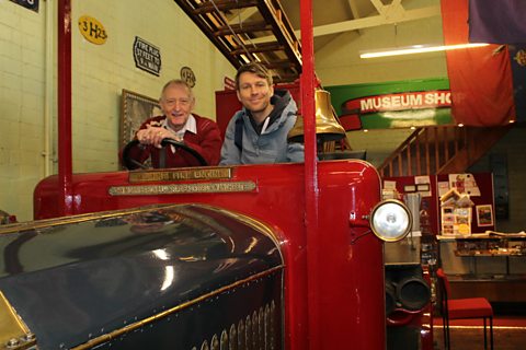 Focus image: Ben in an old fire engine with Bob Bonner of the Greater Manchester Fire Service museum