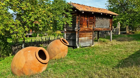 John Henshall/Alamy Many Georgian wineries still use kvevris (large clay vessels) for fermentation (Credit: John Henshall/Alamy)