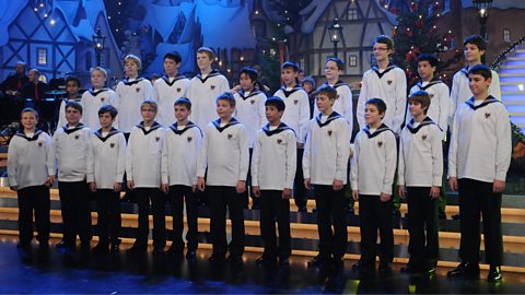 Boys choir performing on stage