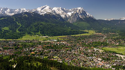 Aerial view on town with the mountains 'Zugspitze' and 'Albspitze'