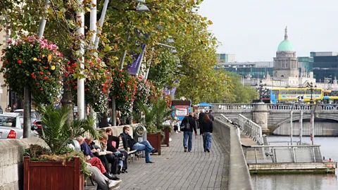 Chris Jackson/Getty Taking a break by the river in Dublin, Ireland (Credit: Chris Jackson/Getty)