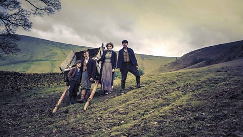 Still from period drama The Village showing how colour is drained to add a period feel