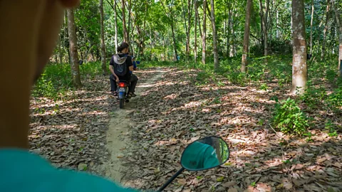 Kit Yeng Chan In Leggong, museum guides ride motorbikes (Credit: Kit Yeng Chan)