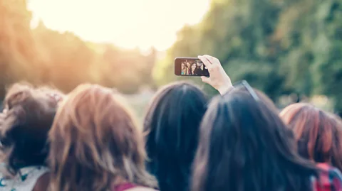 iStock Friends online don't seem to generate the same positive benefits as offline friends (Credit: iStock)