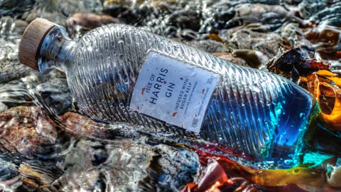 Lewis Mackenzie Each bottle of Isle of Harris gin is shipped across the sea with a handwritten note to the purchaser. (Credit: Lewis Mackenzie)