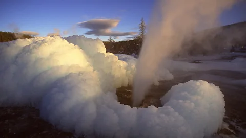Steven Fuller Snow falls between the plumes of steam arising from the hot springs (Credit: Steven Fuller)