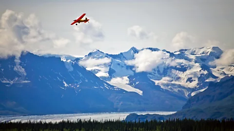 Whit Richardson/Alamy Claus finds air travel is the best way to get around (Credit: Whit Richardson/Alamy)