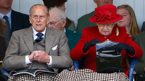 Getty Images The Queen's bags are created by British brand Launer, and she is said to own 200 of them (Credit: Getty Images)