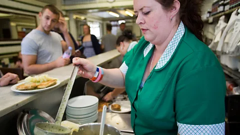 Alamy Hungry customers at Manze's Eel, Pie and Mash shop on Tower Bridge Road in London, UK (Credit: Alamy)