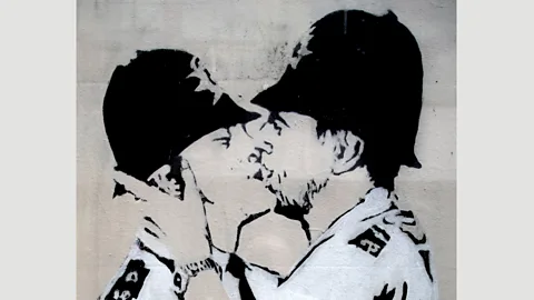 Paul Lovichi Photography/Alamy Stock Photo Banksy’s 2004 mural in Brighton is widely known as ‘Kissing Coppers’ (Credit: Paul Lovichi Photography/Alamy Stock Photo)