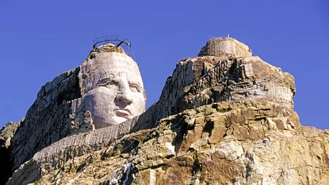 Alamy The Crazy Horse Memorial 17 miles from Mount Rushmore depicts the face of the Oglala Lakota leader 87ft high, compared to the presidents’ 60ft faces (Credit: Alamy)