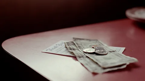 Getty Images There are a number of subtle tricks waiters can use to boost their tips (Credit: Getty Images)