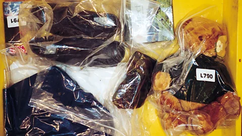 Michael Landy/Parisa Taghizadeh Items circulated on a conveyor belt in yellow trays before each was removed and destroyed (Credit: Michael Landy/Parisa Taghizadeh)