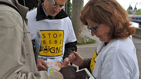 Getty Images Gene editing techniques such as CRISPR has provoked protests in the West as activists fear that parents will be able to create "designer babiers" (Credit: Getty Images)