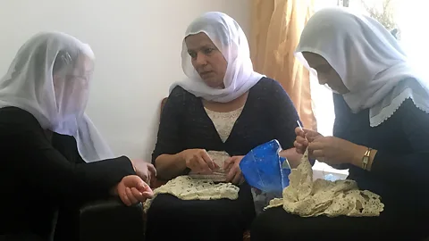 Sara Toth Stub A community of women in Hurfeish sew lace and embroidery as a way to earn money (Credit: Sara Toth Stub)