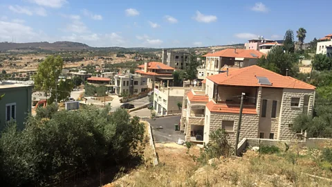 Sara Toth Stub Druze women gather in the village of Hurfeish, in the mountains of northern Israel (Credit: Sara Toth Stub)