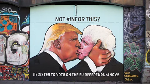 Matt Cardy/Getty Images A mural showing US presidential hopeful Donald Trump sharing a kiss with former London Mayor Boris Johnson (Credit: Matt Cardy/Getty Images)