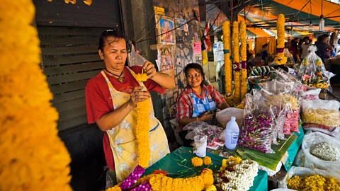 Kevin Foy/Alamy Devotional flower offerings are a staple at Pak Khlong Talad, also known as the Flower Market (Credit: Kevin Foy/Alamy)