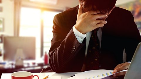 Stressed business man in the office