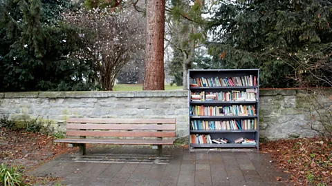 Getty Images Book lovers, publishers and booksellers alike are watching the book-v-ebook sales battle with great interest (Credit: Getty Images)