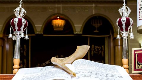 Focus image: a Torah (Hewish holy book) and Shofar (ancient musical horn)