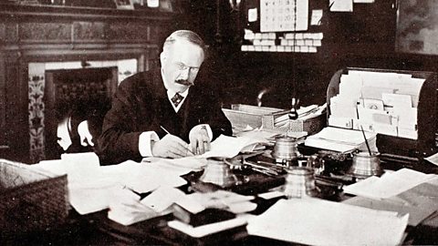 Focus image: Thomas Barnardo writing at a desk