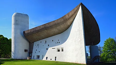 Alamy Notre Dame du Haut in Ronchamp, was a late masterpiece from Le Corbusier, in which he rebuilt a striking chapel on the site of one from the 4th Century (Credit: Alamy)