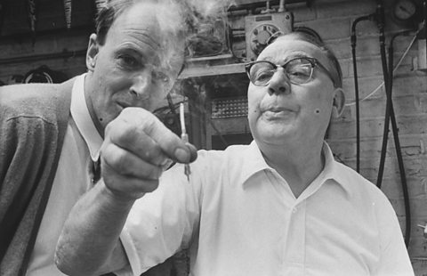 Roald Dahl and Stanley Wade look at their invention.