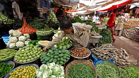 Bloomberg/Getty Customers get free coriander and green chilli in Pakistan and Northern India (Credit: Bloomberg/Getty)