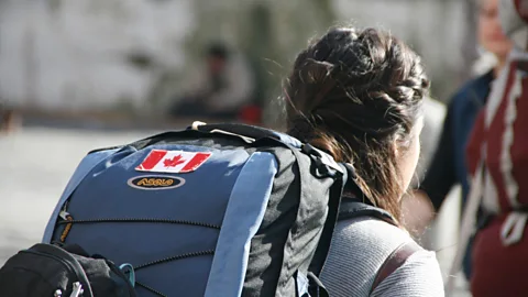 Alamy Canadian English is so similar to US English that Canadians traveling abroad often affix their flag to their backpacks to identify themselves (Credit: Alamy)