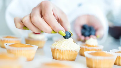 iStock If you want to learn to ice a cake, you might learn quicker by watching someone do it (Credit: iStock)