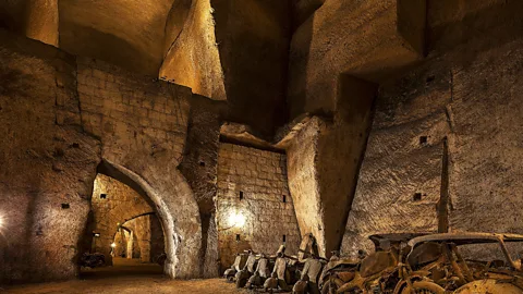 Vittorio Sciosia The air is stale and damp in the dimly lit tunnels of the Galleria Borbonica (Credit: Vittorio Sciosia)