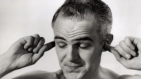 Bettmann/Contributor The optimist in all of us wants to hear no evil. (Credit: Bettmann/Contributor)